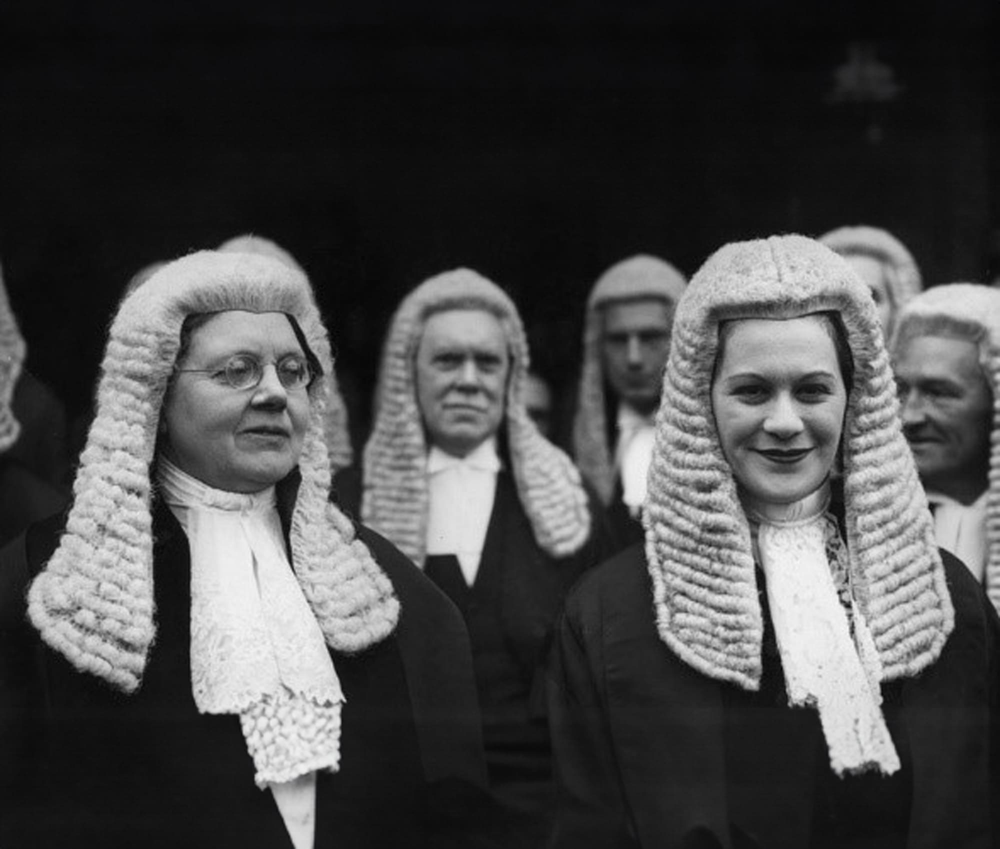 Dame Rose Heilbron and Helena Normantion become the first two women appointed King’s Counsel at the English Bar